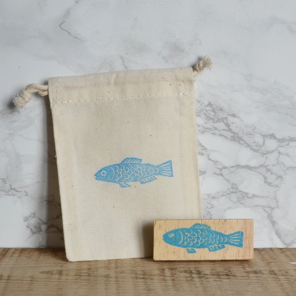 Tampon poisson aux écailles simples