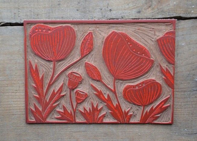 Des coquelicots sous la presse